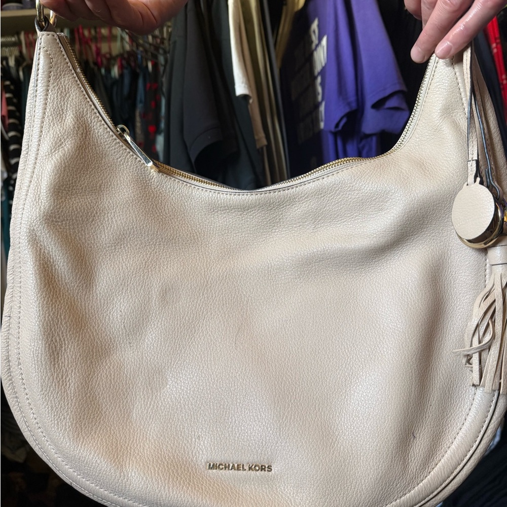 Michael Kors Pink Cream Hobo Bag with Minimalist Design